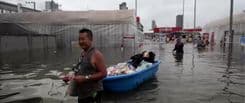Bangkok Residents Rush to Buy Supplies as Floodwaters Recede