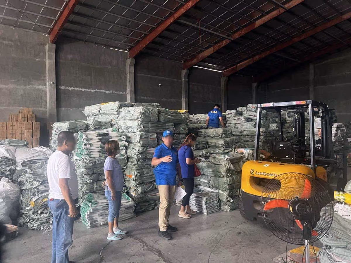Chinese national at secretary, timbog sa Bulacan dahil sa pamemeke ng sako ng premium rice..jpg