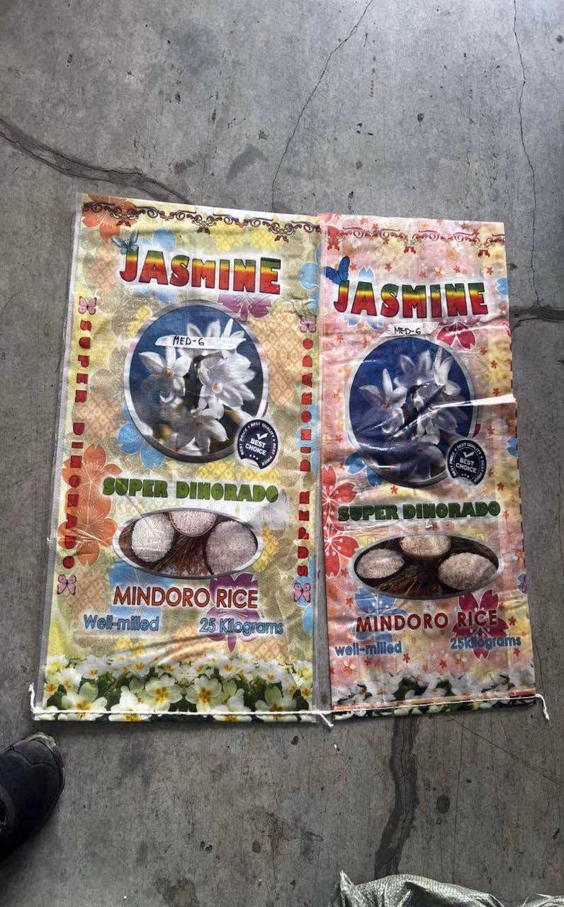 Chinese national at secretary, timbog sa Bulacan dahil sa pamemeke ng sako ng premium rice!.jpg
